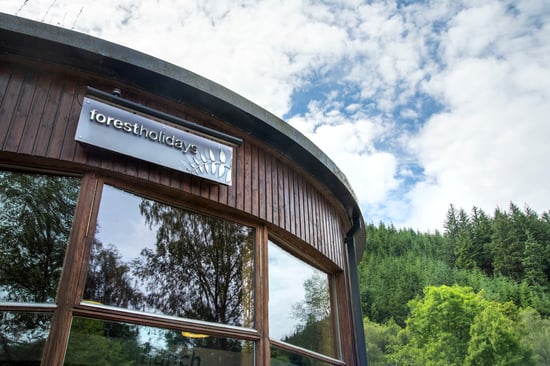 Exterior view of the Forest Retreat building at Strathyre, Forest Holidays