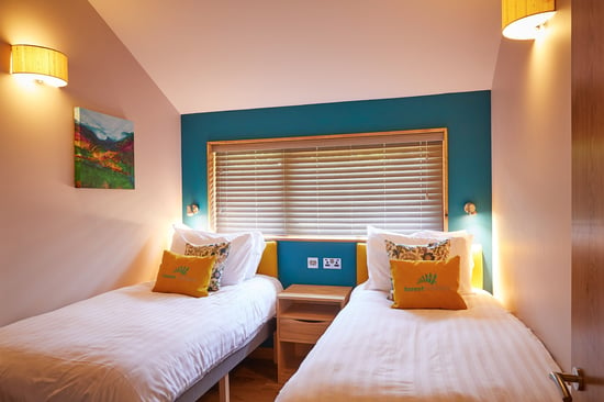 Golden Oak twin bedroom at Beddgelert, Forest Holidays