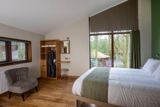 Golden Oak Treehouse upstairs master bedroom at Delamere Forest, Cheshire