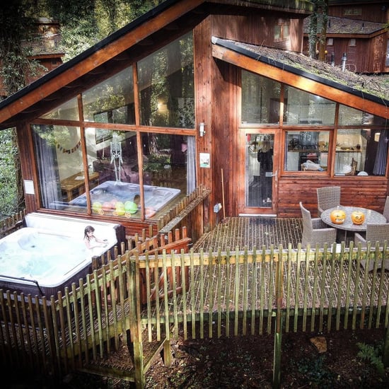 Exterior view of the log cabin and hot tub at Forest of Dean, Forest Holidays by @cefai