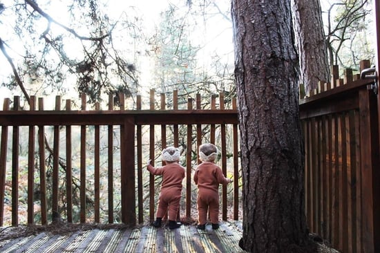 Twin sisters playing on the decking of the cabin at Forest Holidays by @elsie_mabel
