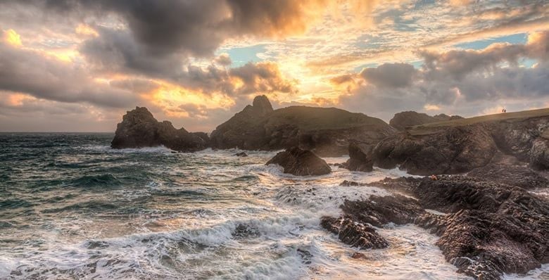 Stormy winters sunset at Kynance Cove