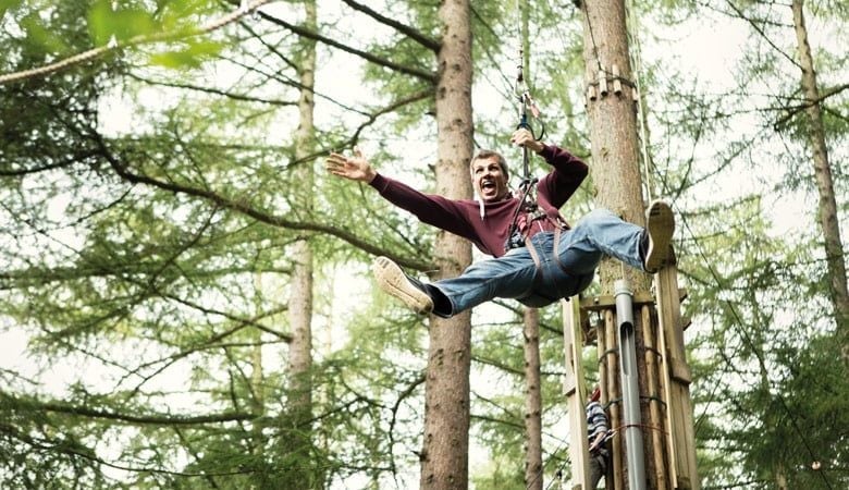 Man singing from the trees at Go Ape