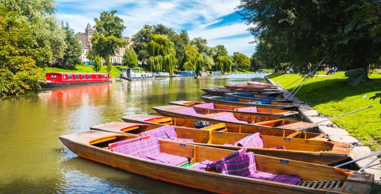 Row of colourful punting boats in Cambridge
