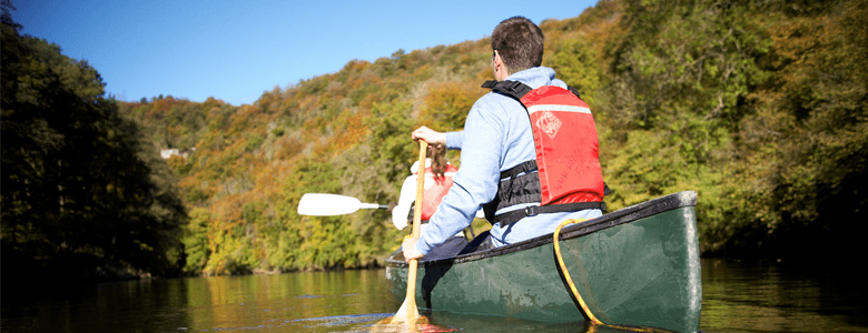 A couple canoeing down the River Wye