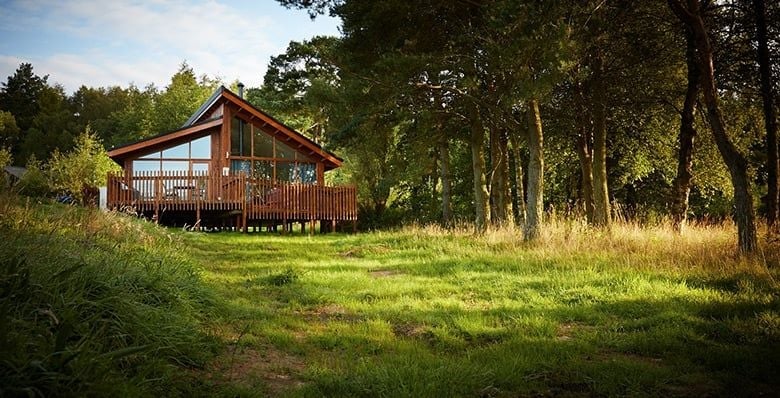 Log cabin situated in a woodland meadow at Cropton, Forest Holidays
