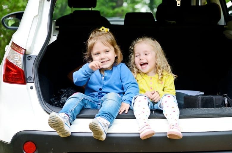 Children sat in the boot of the car 